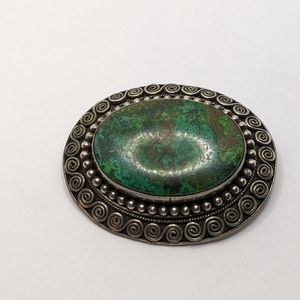 Turquoise and silver brooch
